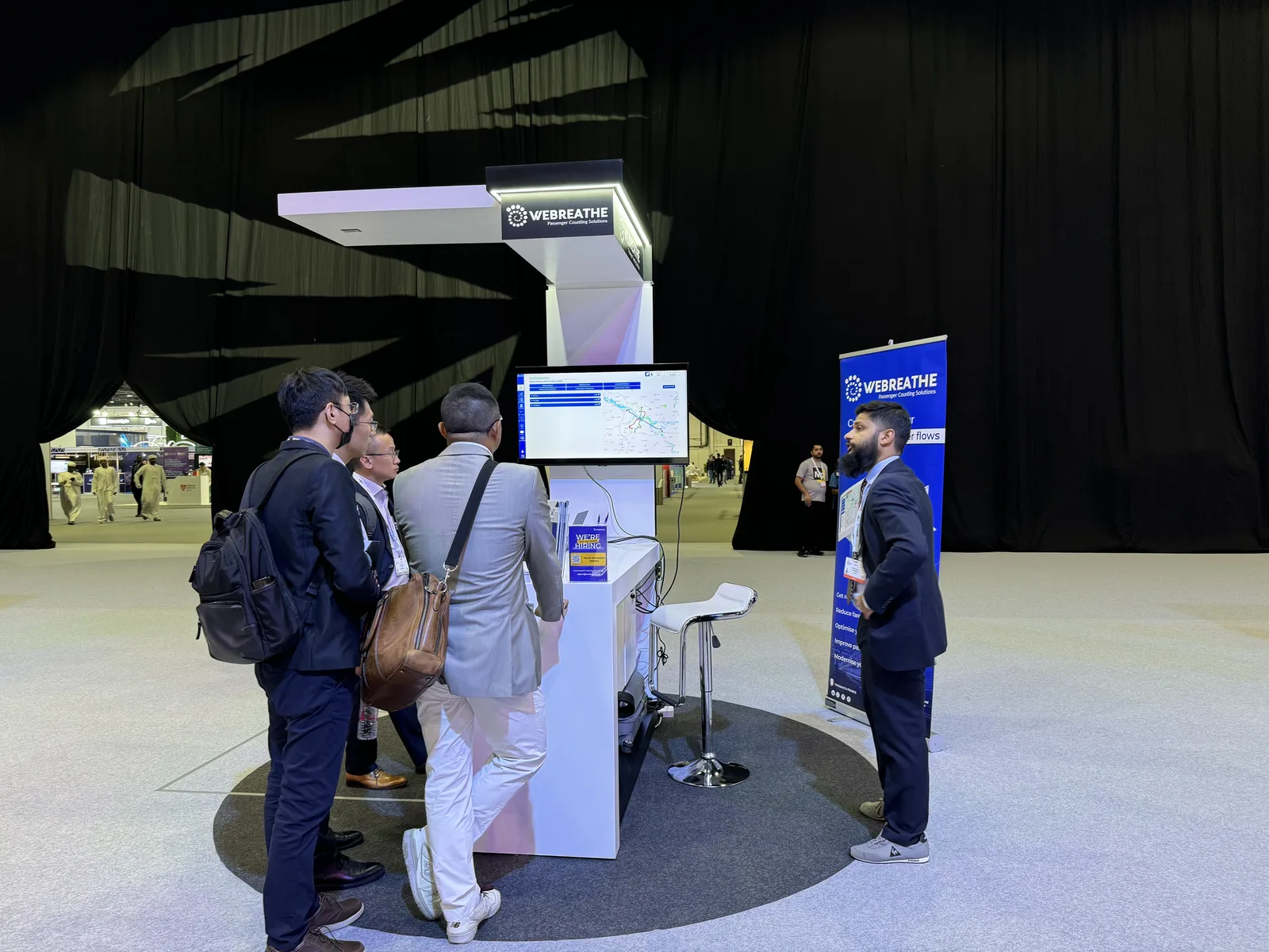 Visitors speaking with the WEBREATHE team at ITS World Congress Dubai